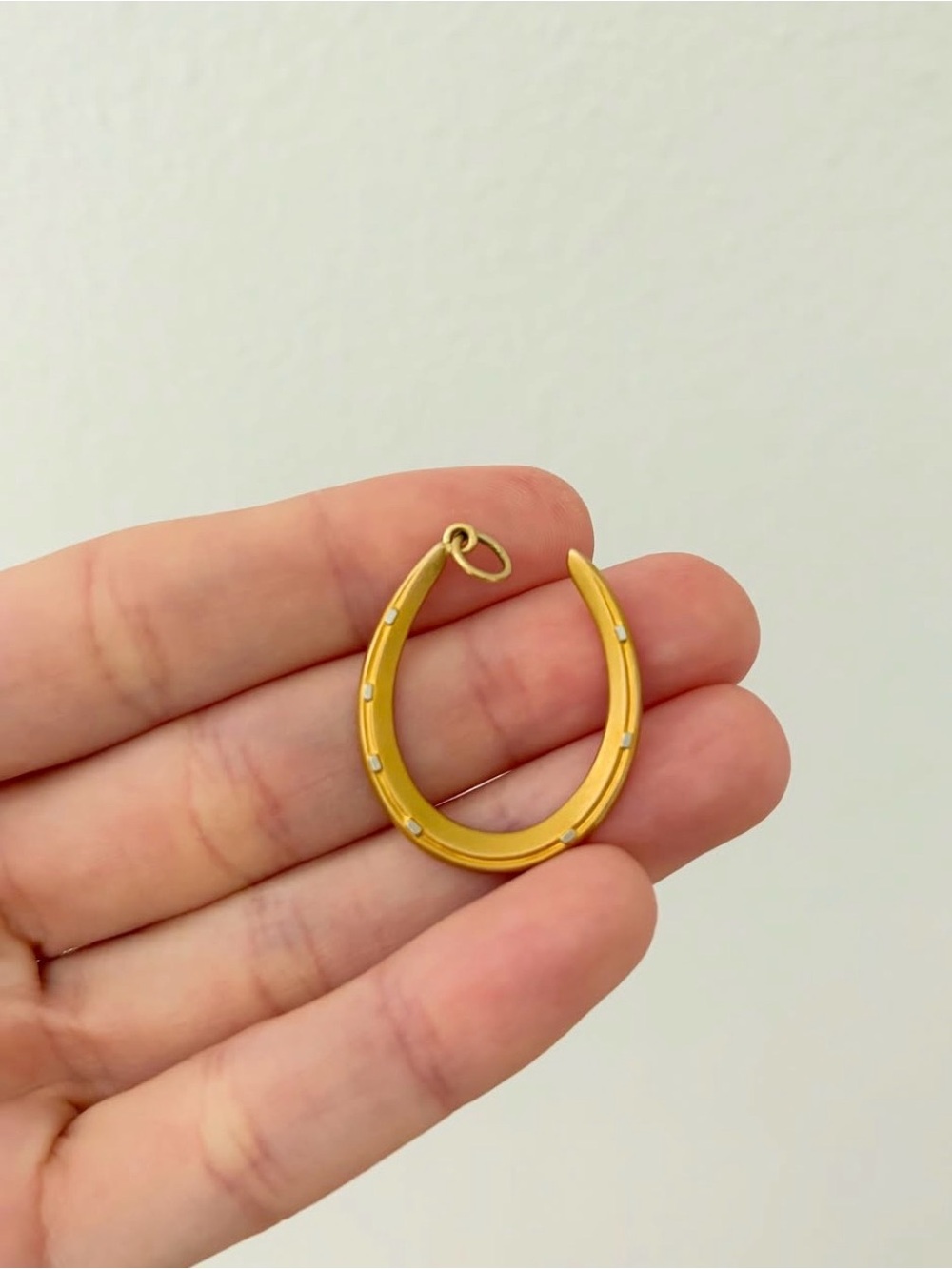 Antique 18k horseshoe charm